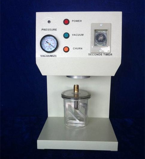 Vacuum mixer dental